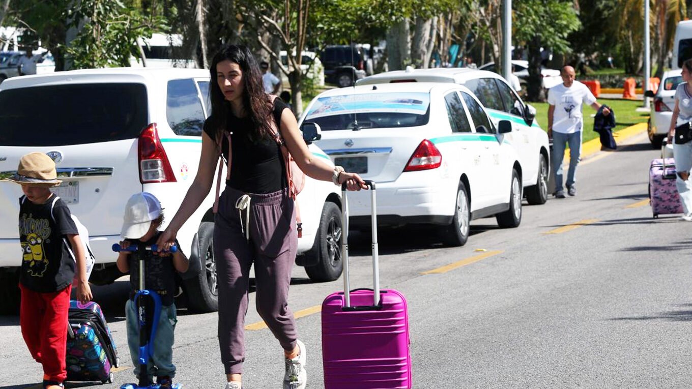Uber vs Taxis Cancún